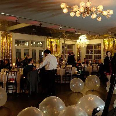The party under the chandeliers, balloons on the floor
