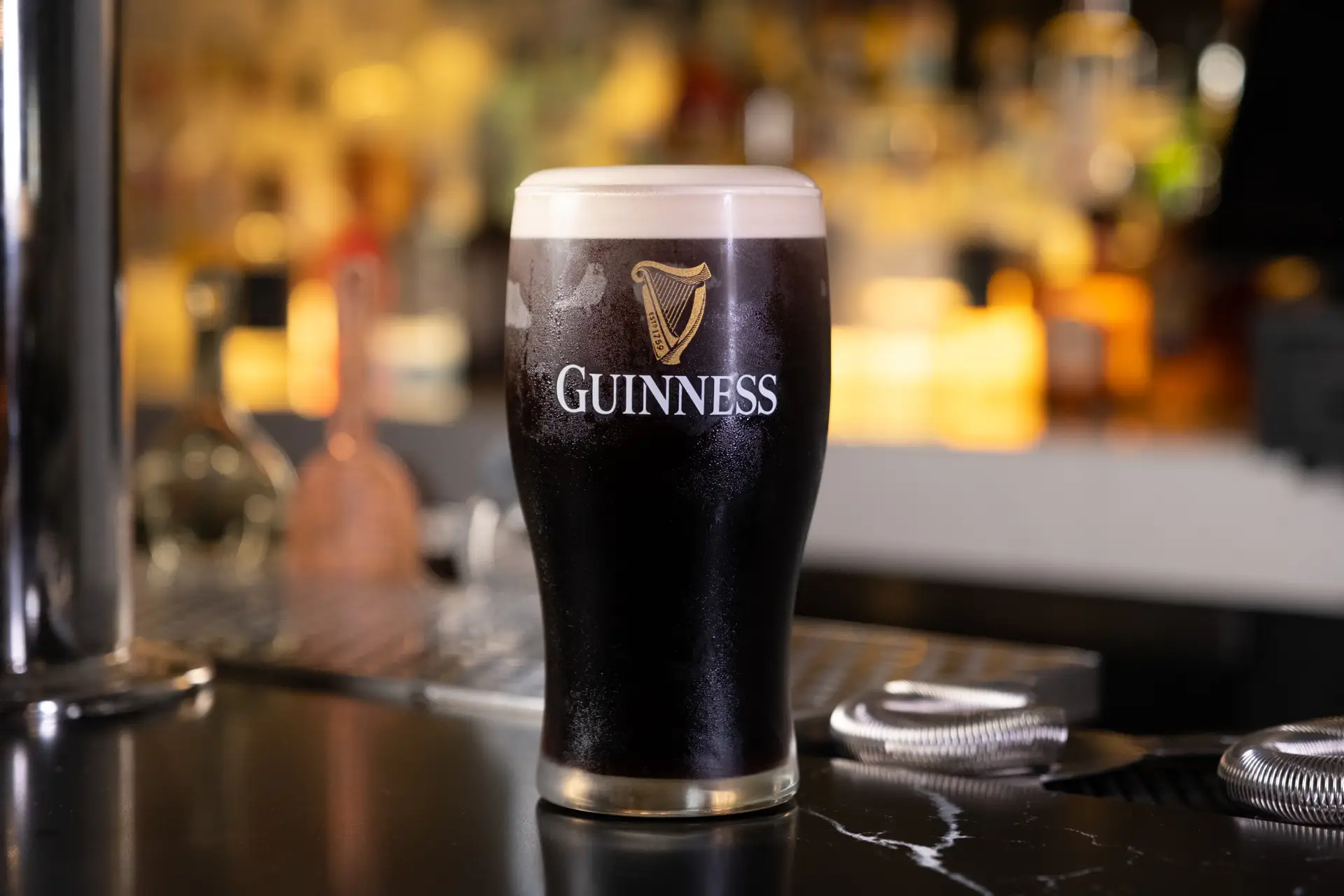 A pint of Guinness on the marble bar