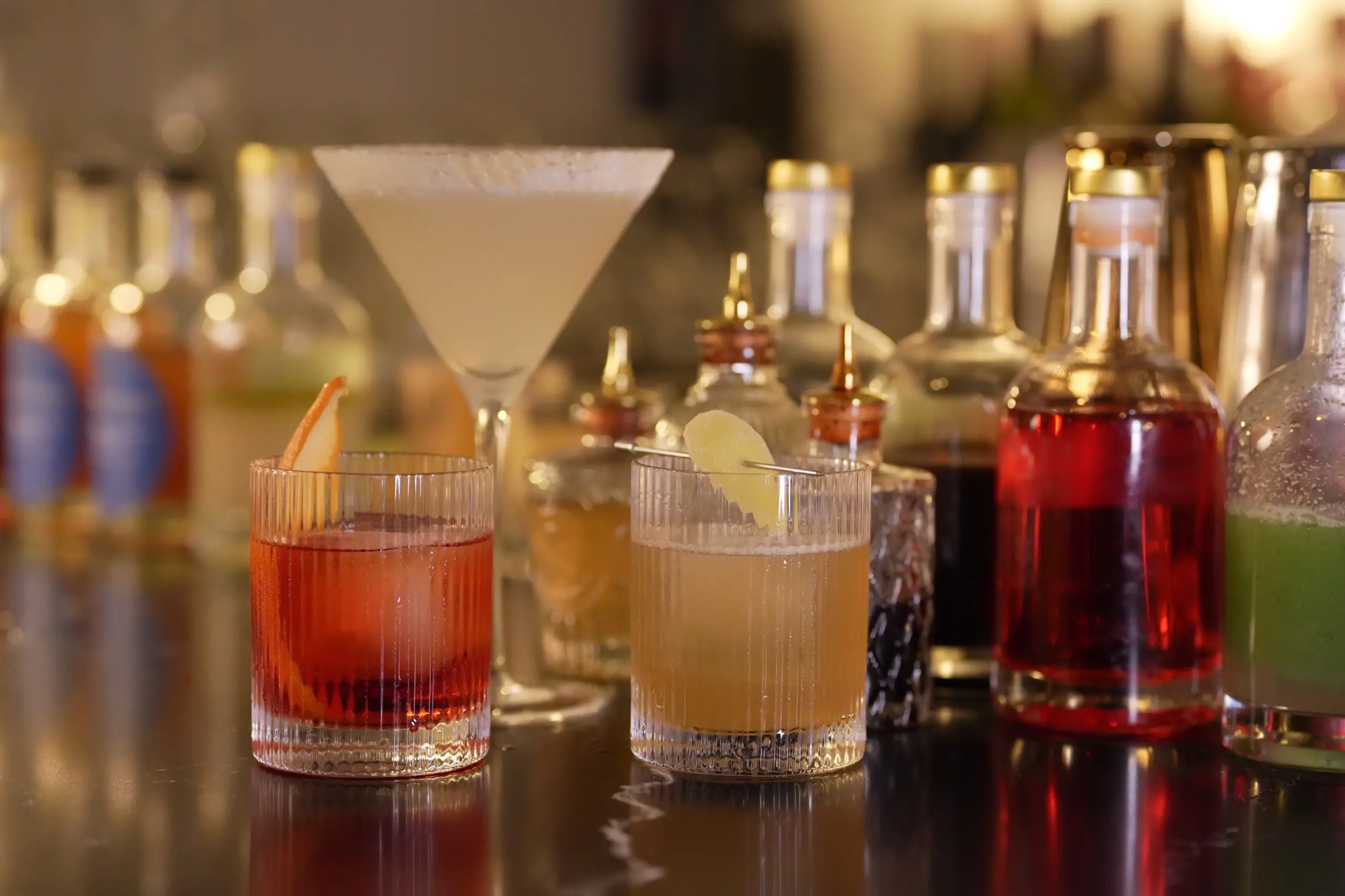 Cocktails lined up on the bar