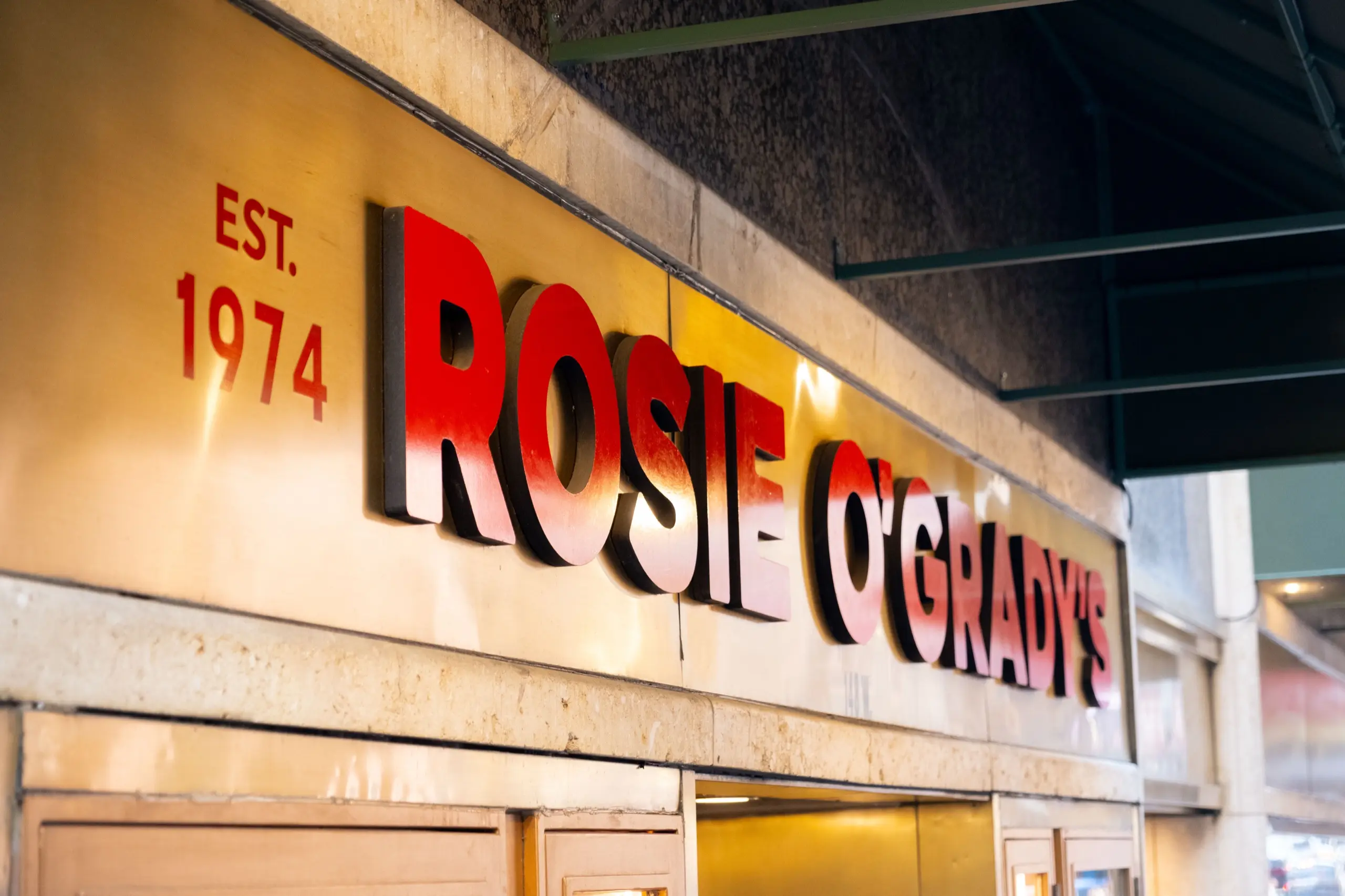 The Rosie O'Grady's sign over the door, Est. 1974